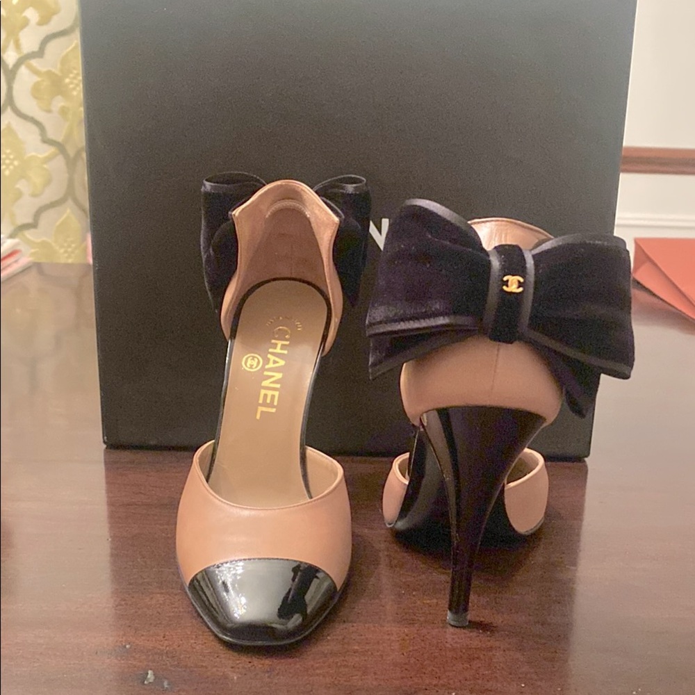 Chanel pump with velvet bow on back. New with box